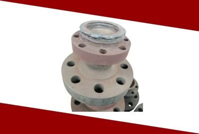 Valve adaptor with weld overlay cladding